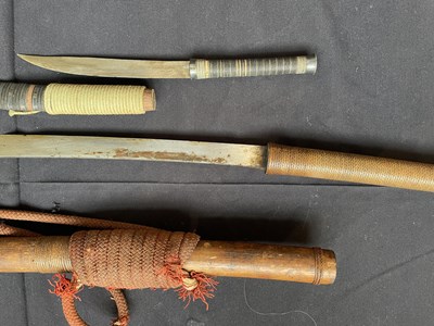 Lot 600 - A BURMESE SWORD (DHA) AND A SMALL DAGGER, LATE 19TH/20TH CENTURY
