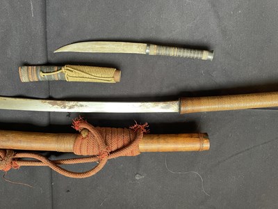 Lot 600 - A BURMESE SWORD (DHA) AND A SMALL DAGGER, LATE 19TH/20TH CENTURY