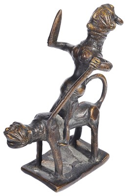 Lot 24 - A TRIBAL BRONZE FIGURE OF DURGA