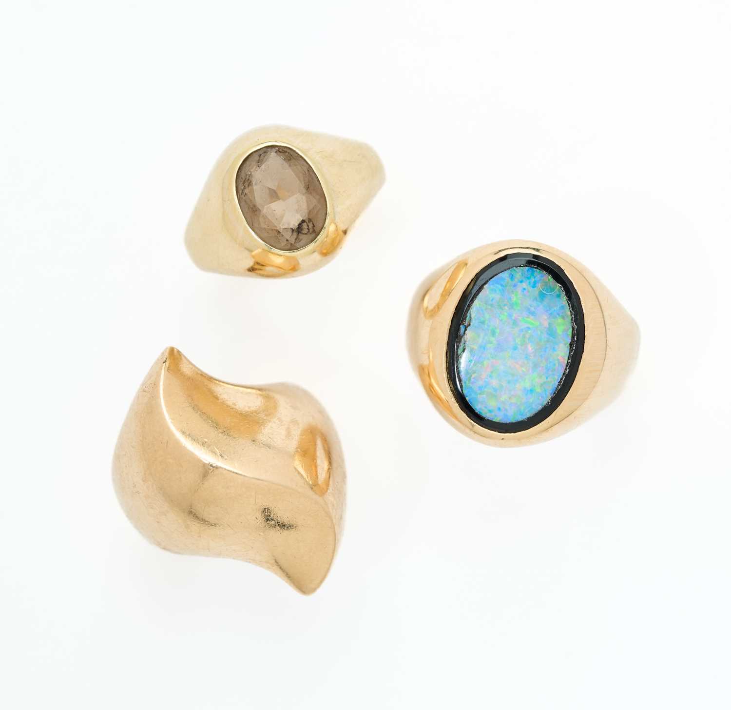 Lot 310 - THREE DRESS RINGS