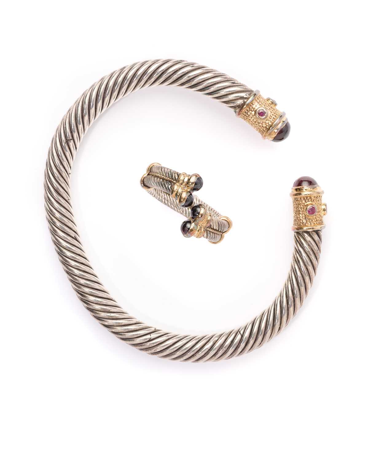 Lot 330 - A SILVER AND GARNET BANGLE AND RING