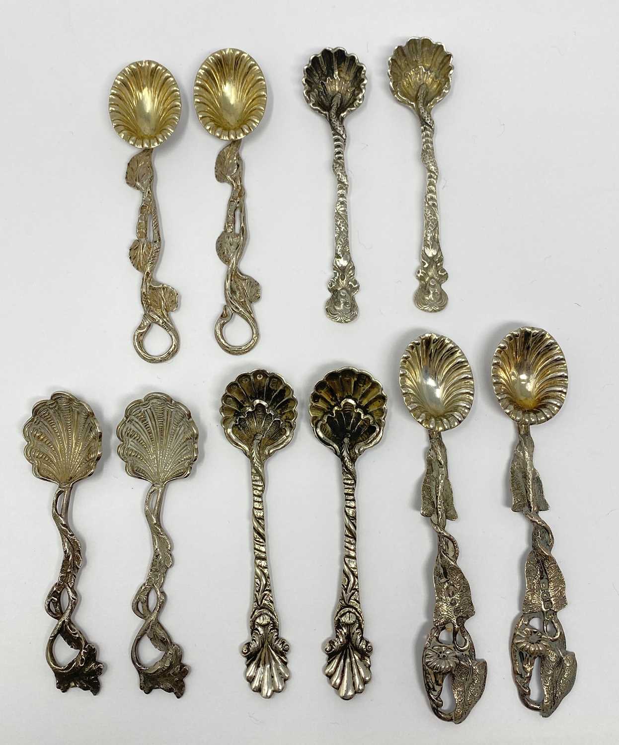 Lot 117 - FIVE PAIRS OF VICTORIAN NATURALISTIC SILVER SALT SPOONS, VARIOUS MAKERS, LONDON OR BIRMINGHAM, 1852-1868