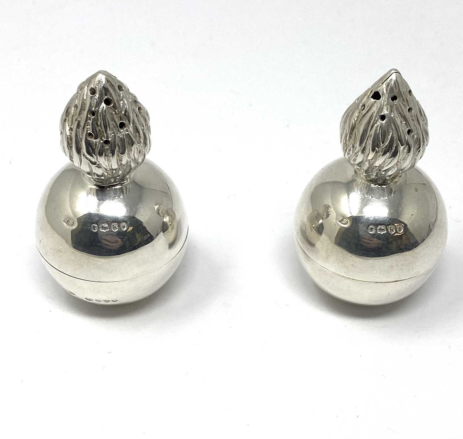 Lot 136 - A PAIR OF VICTORIAN NOVELTY SILVER 'GRENADE' PEPPERETTES, JOSEPH BRAHAM, LONDON, 1885