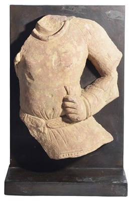 Lot 64 - A KUSHAN MOTTLED PINK SANDSTONE TORSO FRAGMENT