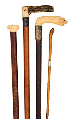 Lot 631 - FOUR WALKING CANES, 19TH CENTURY