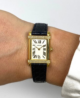 Lot 549 - CARTIER, TANK CHINOISE, REF.2305: GOLD AND DIAMOND LADY'S WRISTWATCH, SWISS, CIRCA 1998