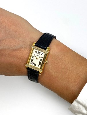 Lot 549 - CARTIER, TANK CHINOISE, REF.2305: GOLD AND DIAMOND LADY'S WRISTWATCH, SWISS, CIRCA 1998