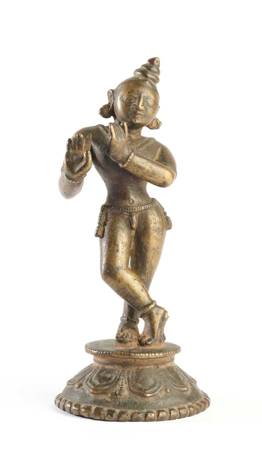 Lot 39 - A BRONZE FIGURE OF KRISHNA VENUGOPALA, ORISSA (ODISHA), EASTERN INDIA, CIRCA 18TH CENTURY