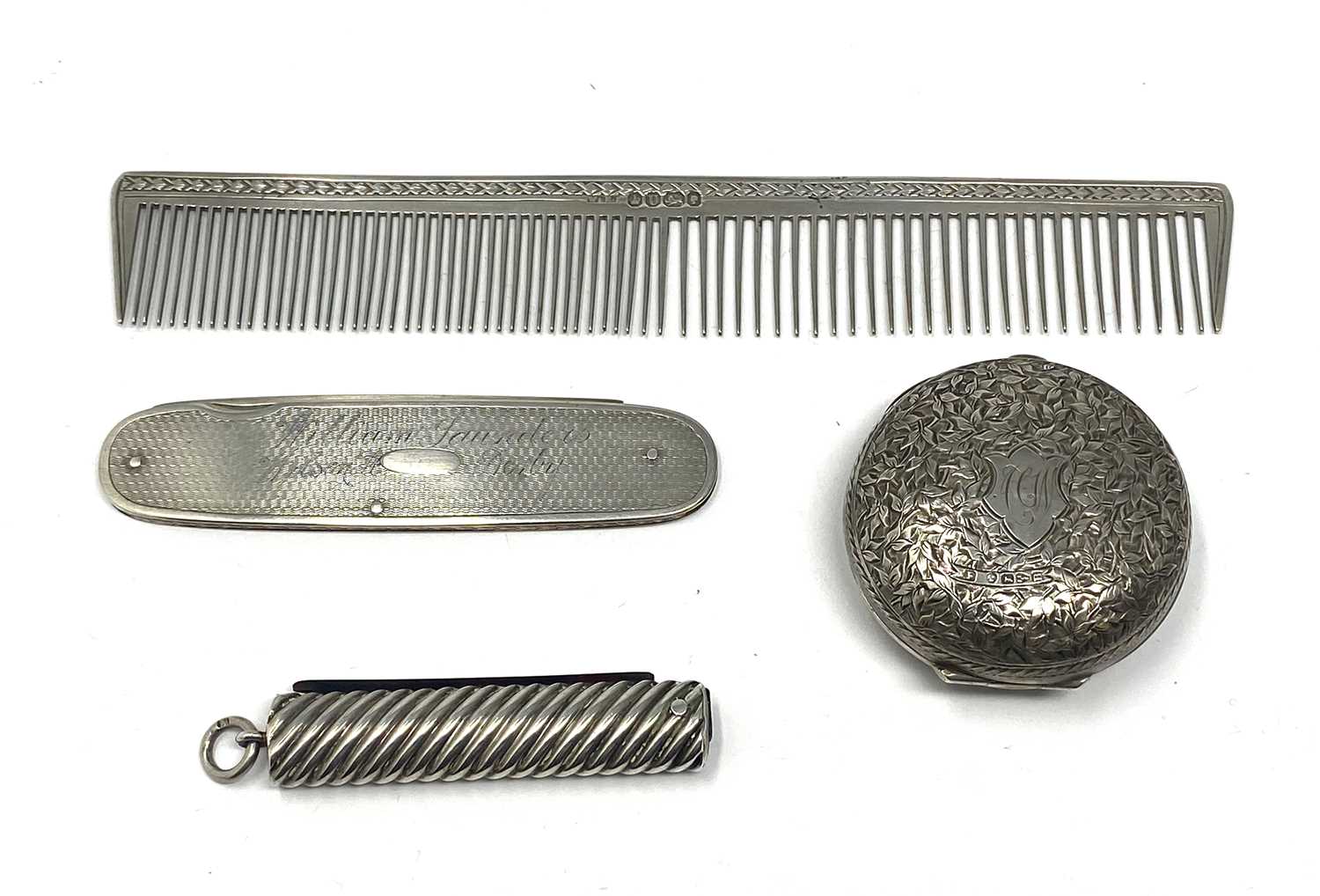 Lot 171 - TWO VICTORIAN SILVER COMBS, BOTH WILLIAM & HENRY HUTCHINSON, SHEFFIELD, 1862
