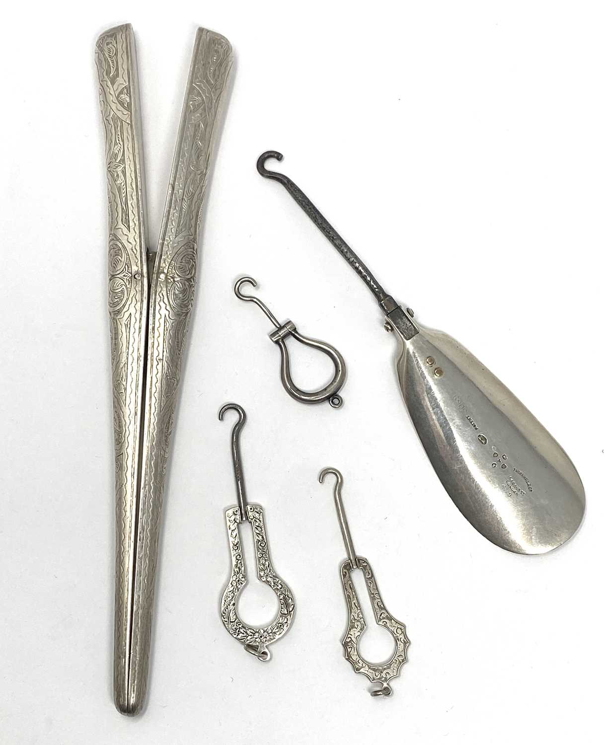 Lot 188 - A PAIR OF VICTORIAN SILVER GLOVE STRETCHERS AND A PATENT SHOE HORN BUTTON HOOK, BOTH LONDON, 1880 /83 RESPECTIVELY