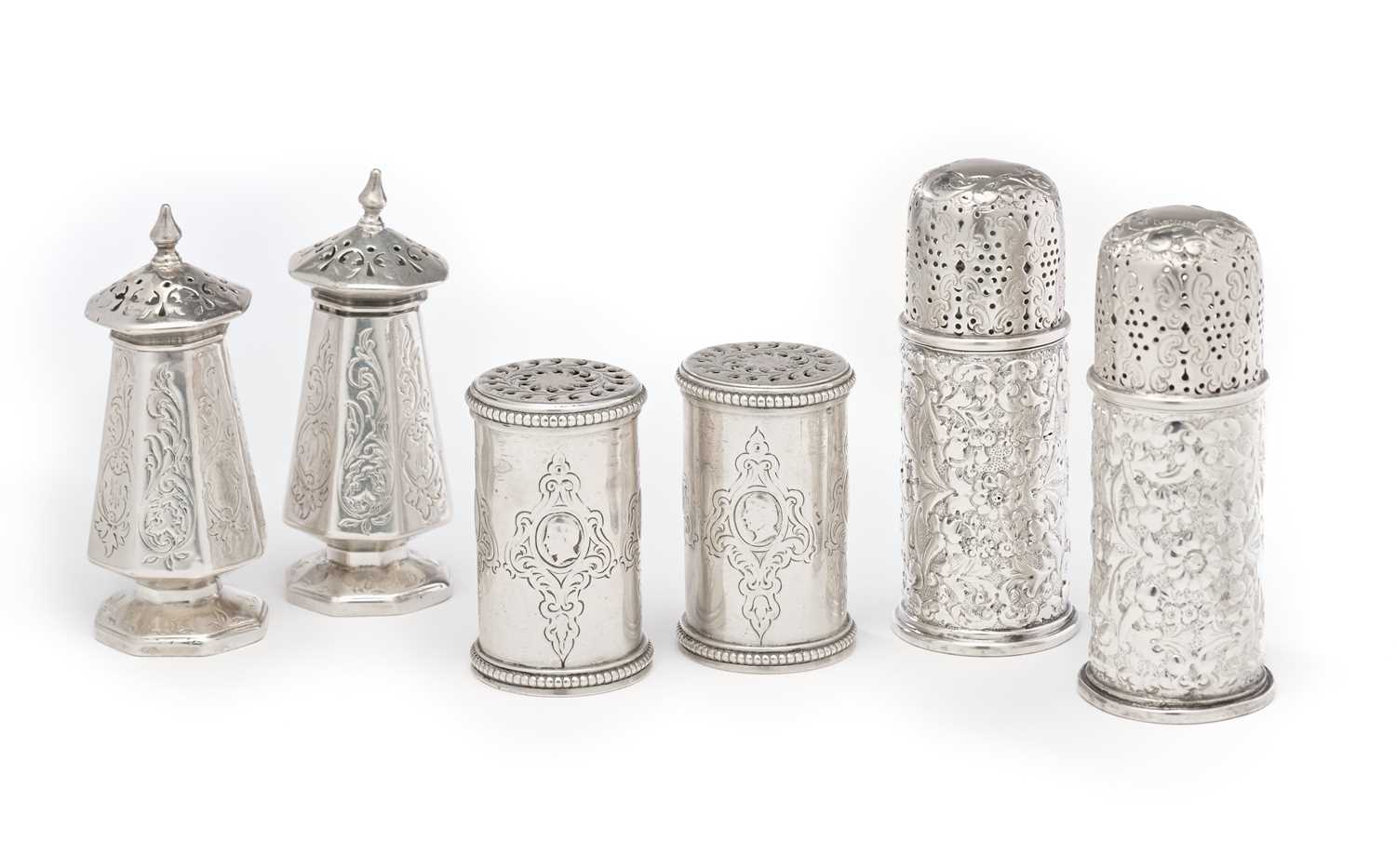 Lot 576 - THREE PAIRS OF VICTORIAN SILVER PEPPERETTES OR CASTERS