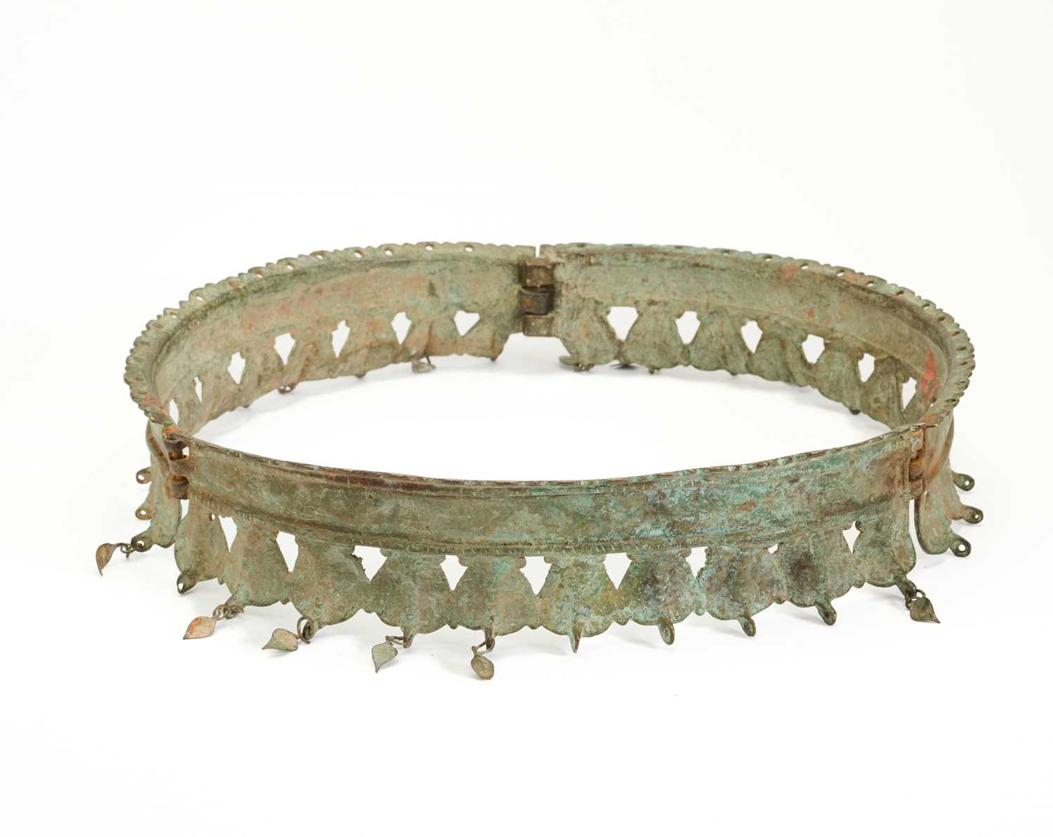 Lot 11 - A RARE SOUTH INDIAN COPPER ALLOY CEREMONIAL FOOT BAND FOR AN ELEPHANT, 17TH CENTURY, POSSIBLY KERALA