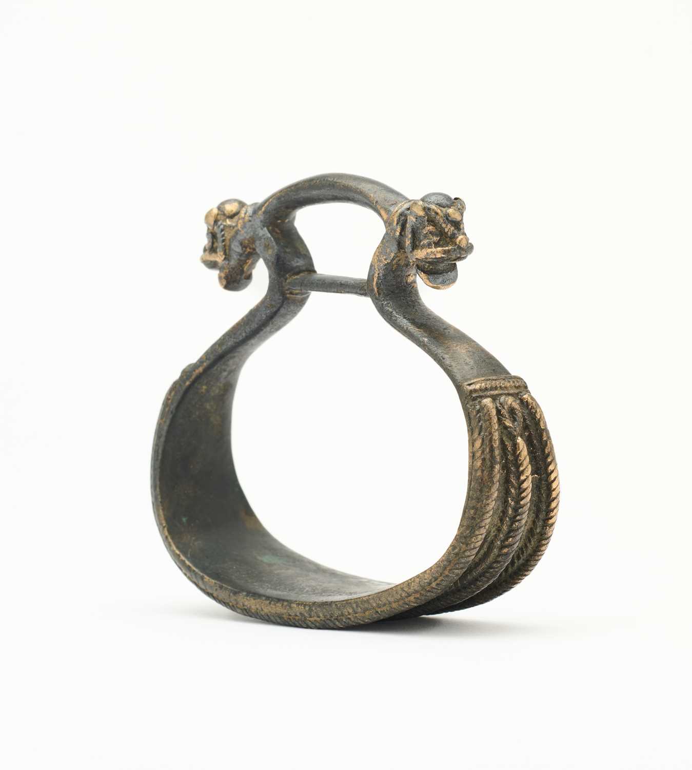 Lot 17 - AN INDIAN COPPER ALLOY STIRRUP (RAKAB), 17TH/18TH CENTURY