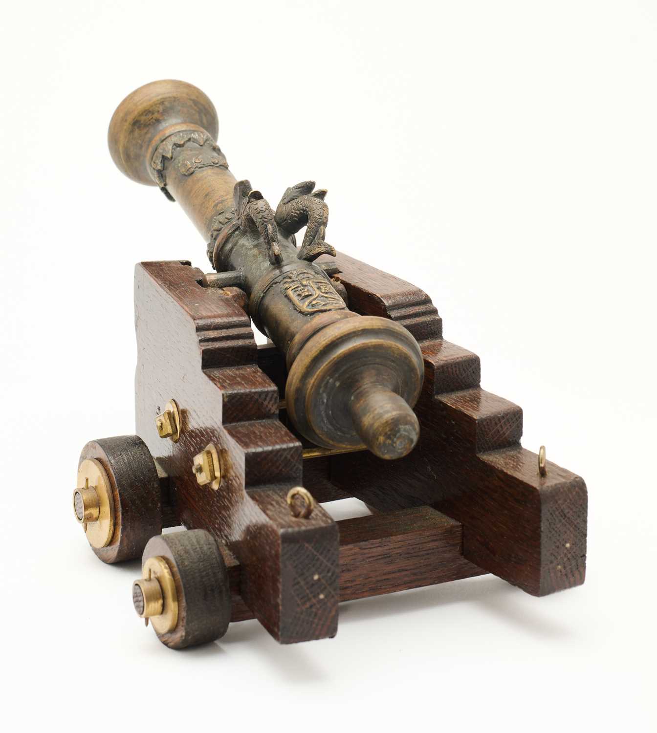 Lot 735 - A MINIATURE BRONZE CANNON IN 17TH CENTURY STYLE, 20TH CENTURY