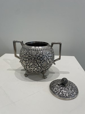 Lot 206 - A KUTCH SILVER TEASET, OOMERSI MAWJI OF BHUJ, WESTERN INDIA, 1880-1890