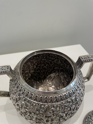 Lot 206 - A KUTCH SILVER TEASET, OOMERSI MAWJI OF BHUJ, WESTERN INDIA, 1880-1890