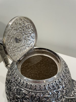 Lot 206 - A KUTCH SILVER TEASET, OOMERSI MAWJI OF BHUJ, WESTERN INDIA, 1880-1890