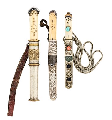 Lot 521 - THREE TIBETAN OR BHUTANESE DAGGERS, PROBABLY 20TH CENTURY