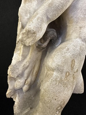 Lot 80 - A ROMAN MARBLE RELIEF FRAGMENT DEPICTING A DANCING SATYR, 2ND/3RD CENTURY A.D.