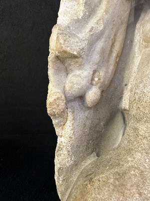 Lot 80 - A ROMAN MARBLE RELIEF FRAGMENT DEPICTING A DANCING SATYR, 2ND/3RD CENTURY A.D.