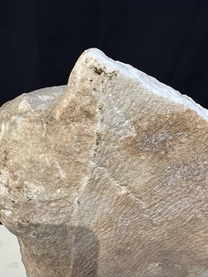 Lot 80 - A ROMAN MARBLE RELIEF FRAGMENT DEPICTING A DANCING SATYR, 2ND/3RD CENTURY A.D.