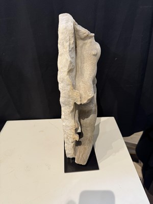 Lot 80 - A ROMAN MARBLE RELIEF FRAGMENT DEPICTING A DANCING SATYR, 2ND/3RD CENTURY A.D.