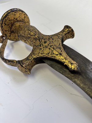 Lot 14 - AN INDIAN TULWAR, THE HILT 18TH CENTURY