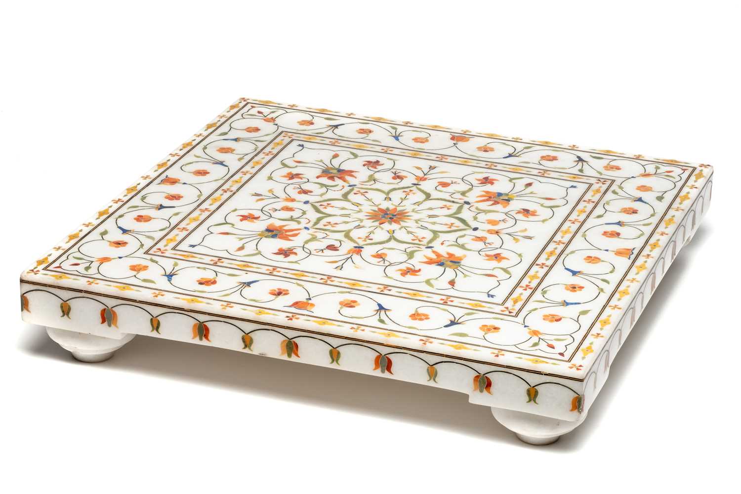 Lot 125 - A MUGHAL STYLE PIETRA DURA INLAID MARBLE FOOTSTOOL, AGRA, NORTHERN INDIA