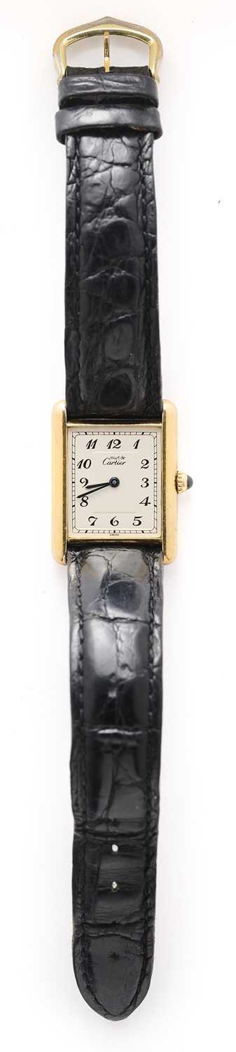 Lot 535 - CARTIER (MUST DE): TANK VERMEIL, REF.590005: MID SIZE SILVER-GILT WRISTWATCH, SWISS, CIRCA 1990