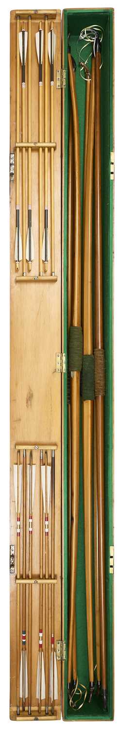 Lot 77 - SIX CASED ALDRED LONGBOWS AND TWO SETS OF ARROWS, LATE 19TH EARLY 20TH CENTURY