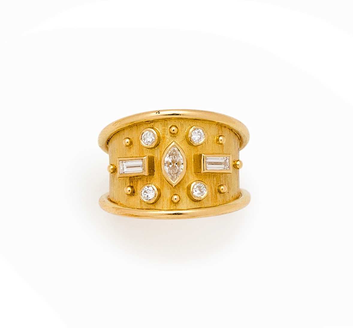 Lot 705 - MCCABE MCCARTY: GOLD AND DIAMOND RING, 1976