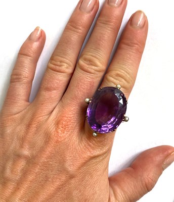 Lot 653 - AMETHYST AND SEED PEARL RING, 1890s COMPOSITE