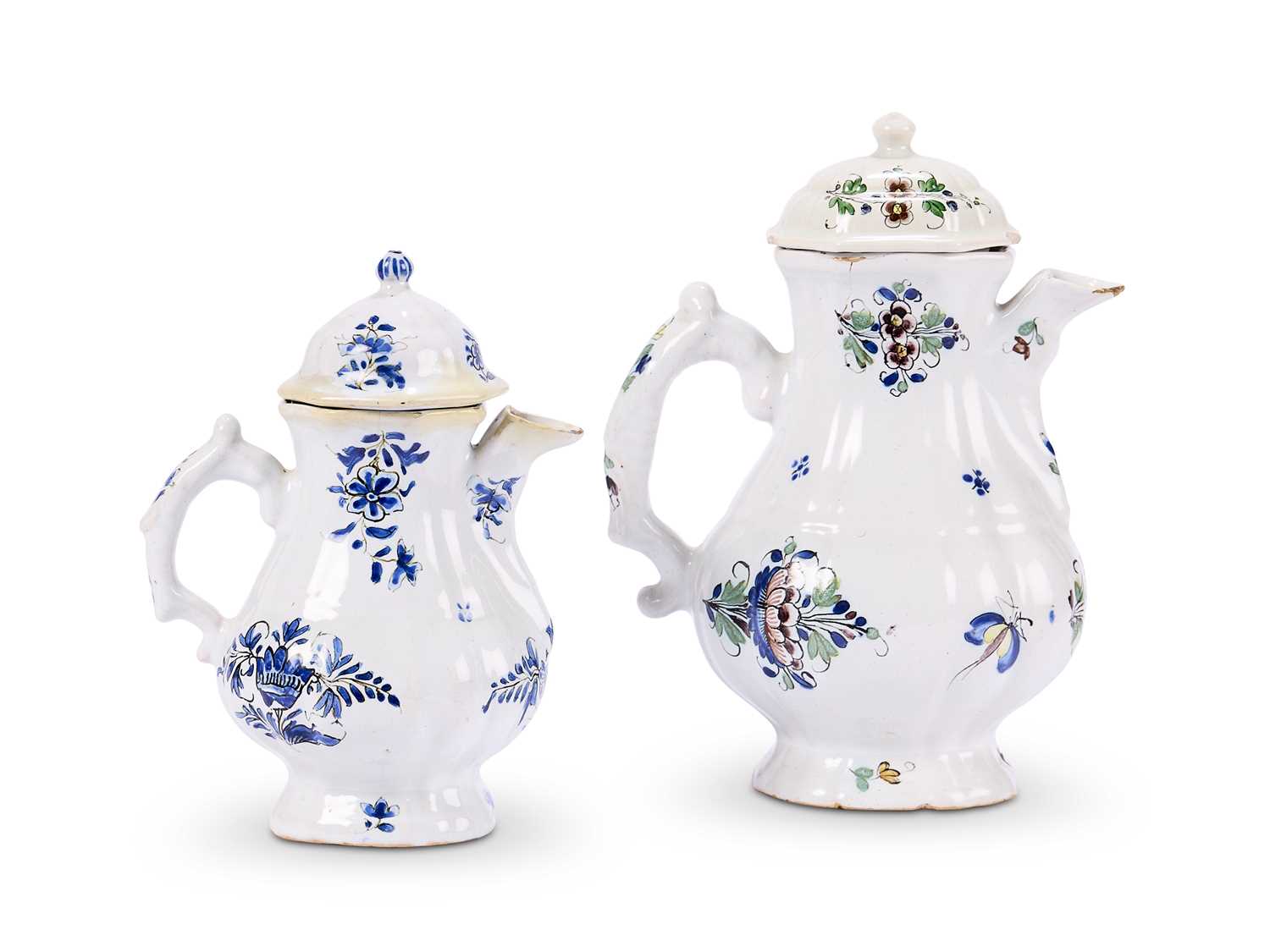Lot 4 - TWO HOLITSCH FAIENCE COFFEE POTS AND COVERS, LATER 18TH CENTURY