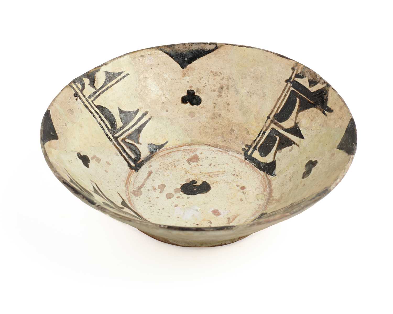 Lot 353 - A SAMANID SLIP PAINTED POTTERY BOWL, CENTRAL ASIA OR NORTH EASTERN PERSIA, 10TH CENTURY