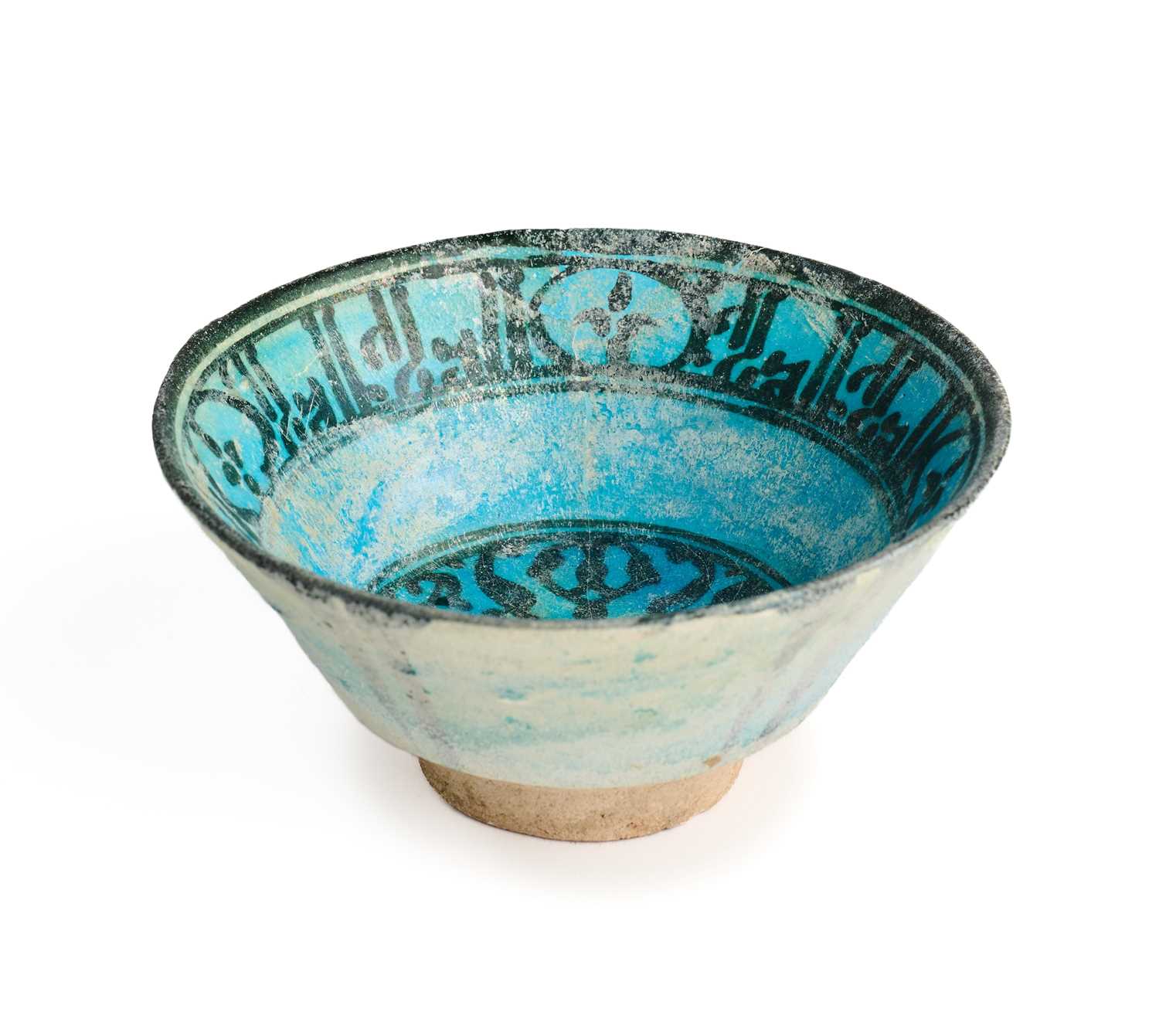 Lot 359 - A KASHAN BLACK PAINTED TURQUOISE BOWL, PERSIA, 12TH/13TH CENTURY