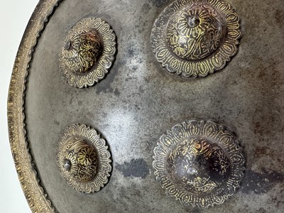 Lot 566 - AN INDIAN CIRCULAR DHAL OF WOOTZ STEEL, 19TH CENTURY
