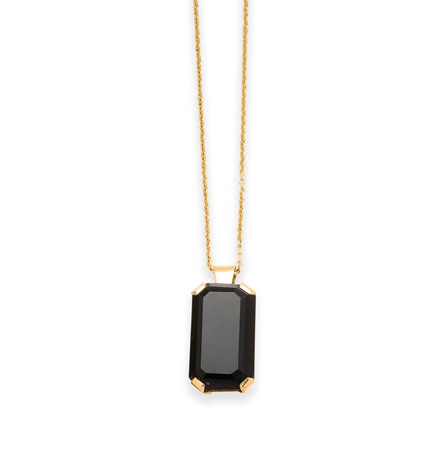 Lot 574 - SMOKEY QUARTZ PENDANT, 1960s