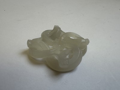 Lot 78 - A CHINESE WHITE JADE 'CHILONG' PENDANT, QING DYNASTY (1644-1911)