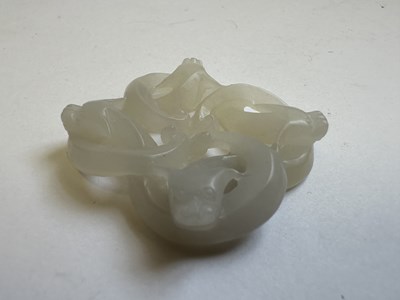 Lot 78 - A CHINESE WHITE JADE 'CHILONG' PENDANT, QING DYNASTY (1644-1911)