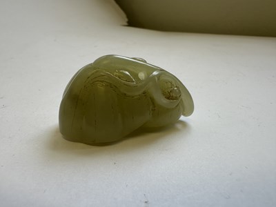Lot 81 - A CHINESE CELADON JADE SEED POD PENDANT, QING DYNASTY (1644-1911)