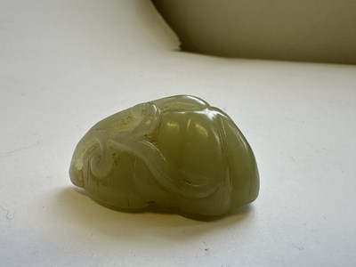 Lot 81 - A CHINESE CELADON JADE SEED POD PENDANT, QING DYNASTY (1644-1911)