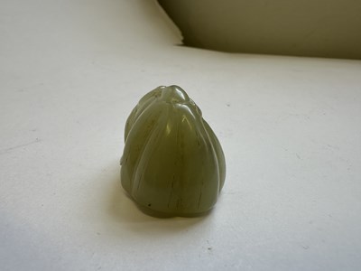 Lot 81 - A CHINESE CELADON JADE SEED POD PENDANT, QING DYNASTY (1644-1911)