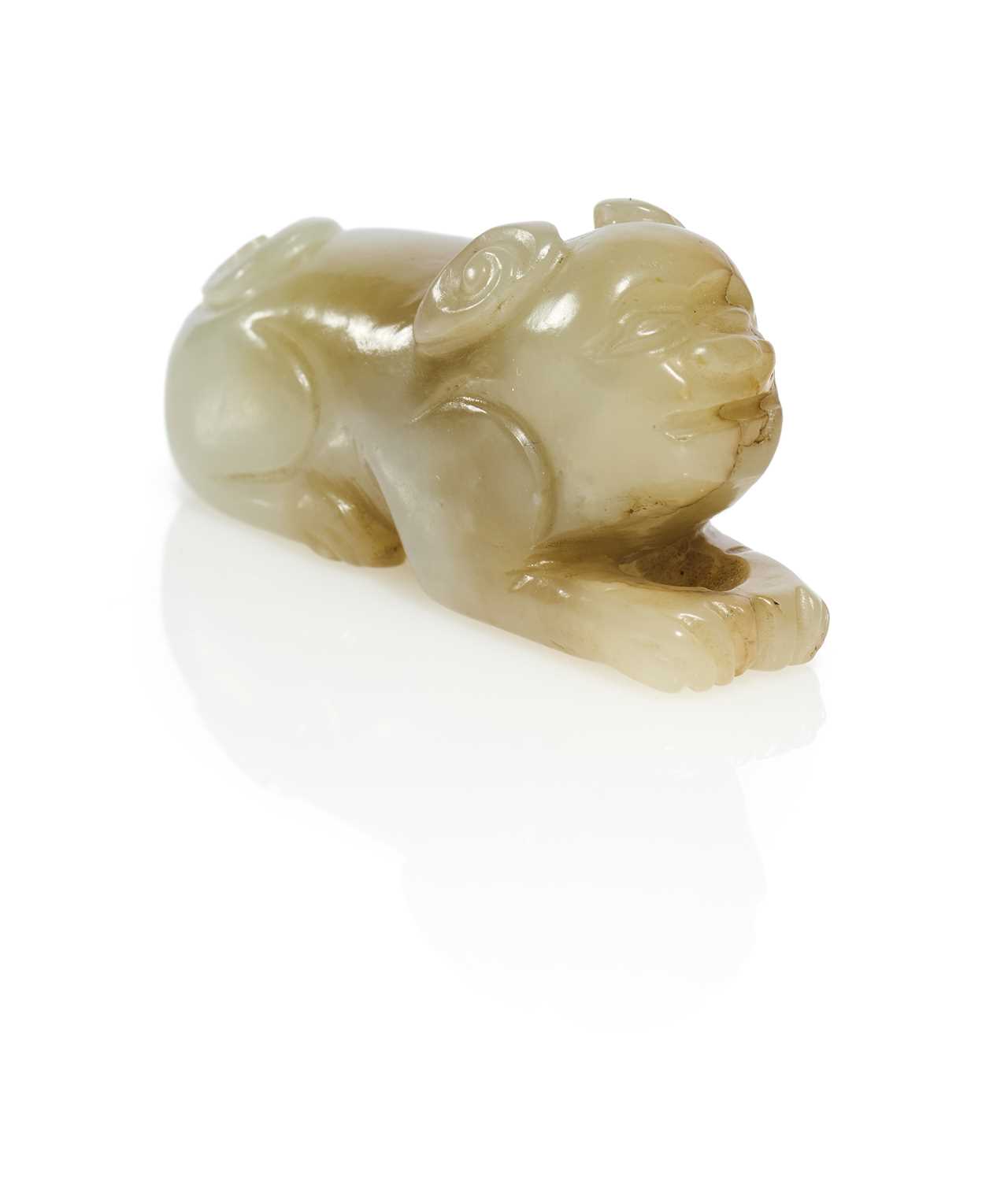 Lot 64 - A CHINESE CARVED JADE HOUND, QING DYNASTY (1644-1911)