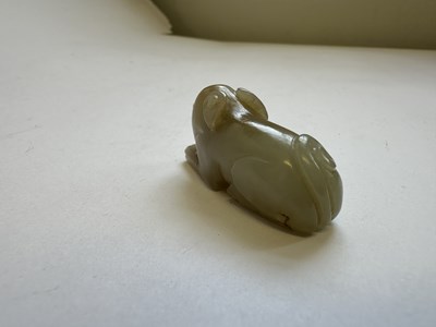 Lot 64 - A CHINESE CARVED JADE HOUND, QING DYNASTY (1644-1911)