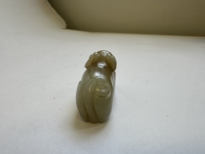 Lot 64 - A CHINESE CARVED JADE HOUND, QING DYNASTY (1644-1911)