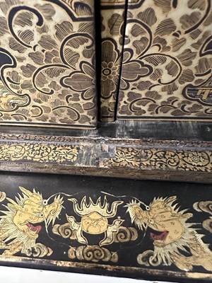 Lot 32 - A GOOD CHINESE EXPORT GILT DECORATED BLACK LACQUER COLLECTOR'S CABINET ON STAND, CIRCA 1815