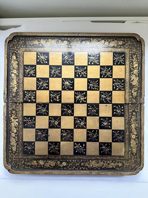 Lot 35 - A CHINESE EXPORT LACQUER FOLDING GAMES BOARD, QING DYNASTY, MID 19TH CENTURY