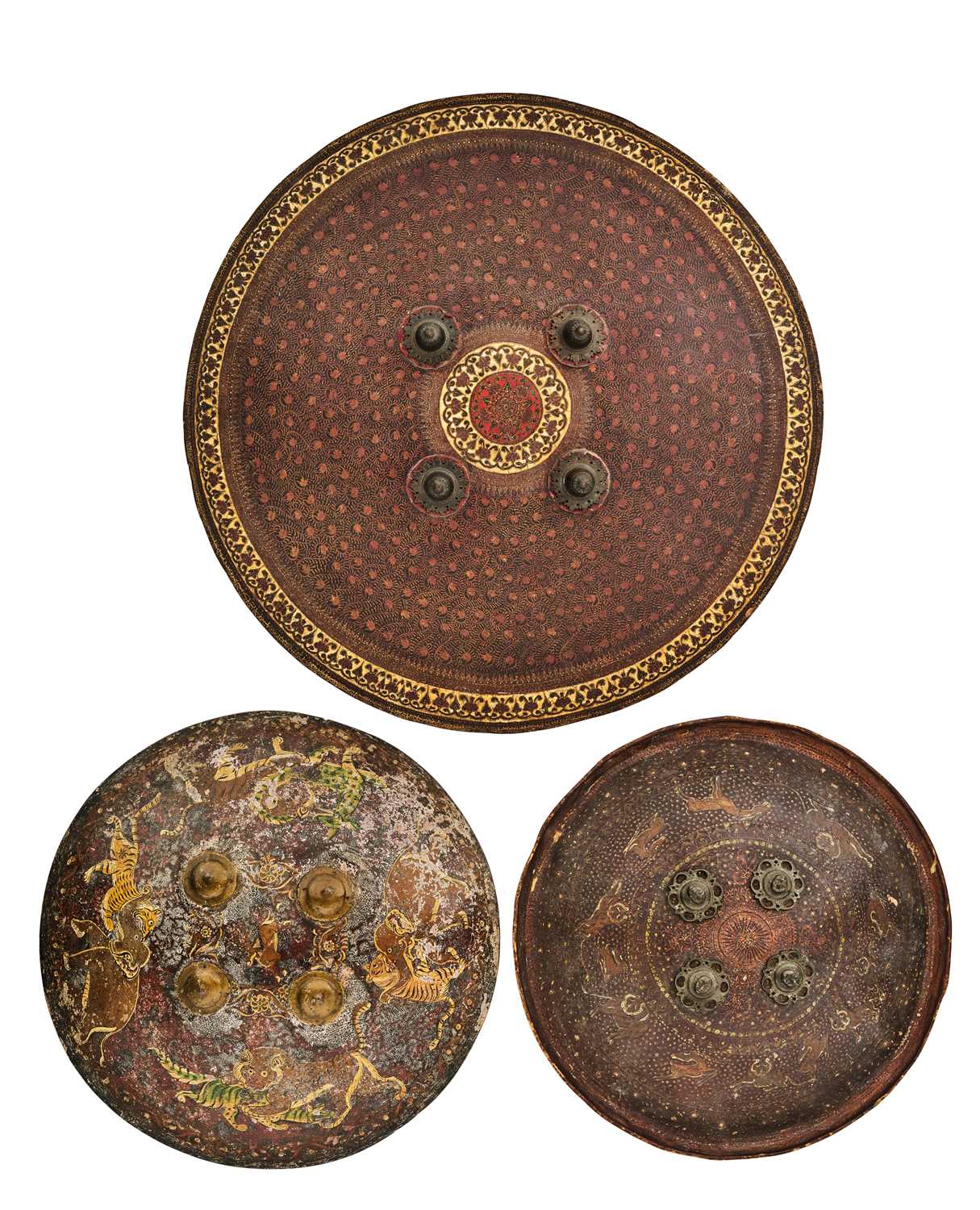 Lot 565 - THREE INDIAN HIDE SHIELDS (DHAL), 19TH CENTURY