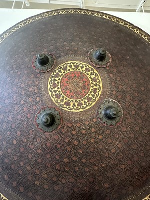 Lot 565 - THREE INDIAN HIDE SHIELDS (DHAL), 19TH CENTURY