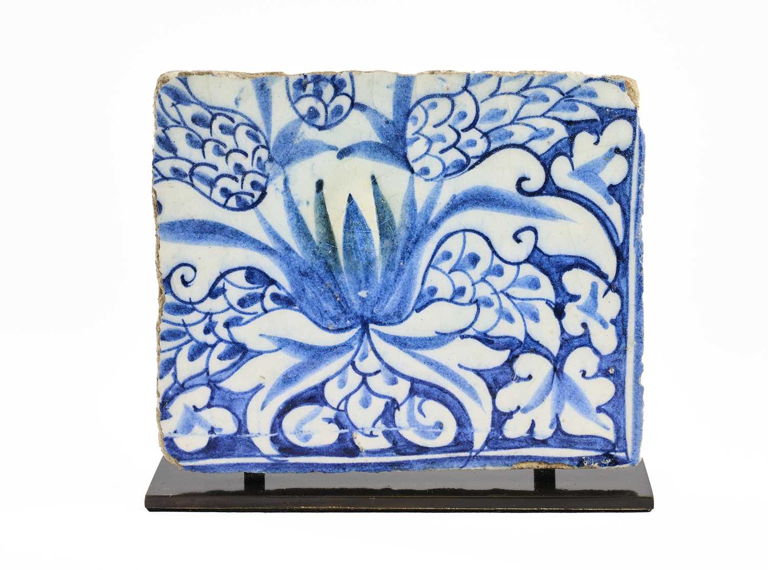 Lot 132 - A MAMLUK BLUE AND WHITE TILE, SYRIA OR EGYPT, 15TH CENTURY